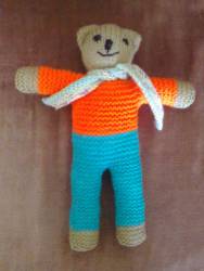 Knitted teddy - click to see how you can help